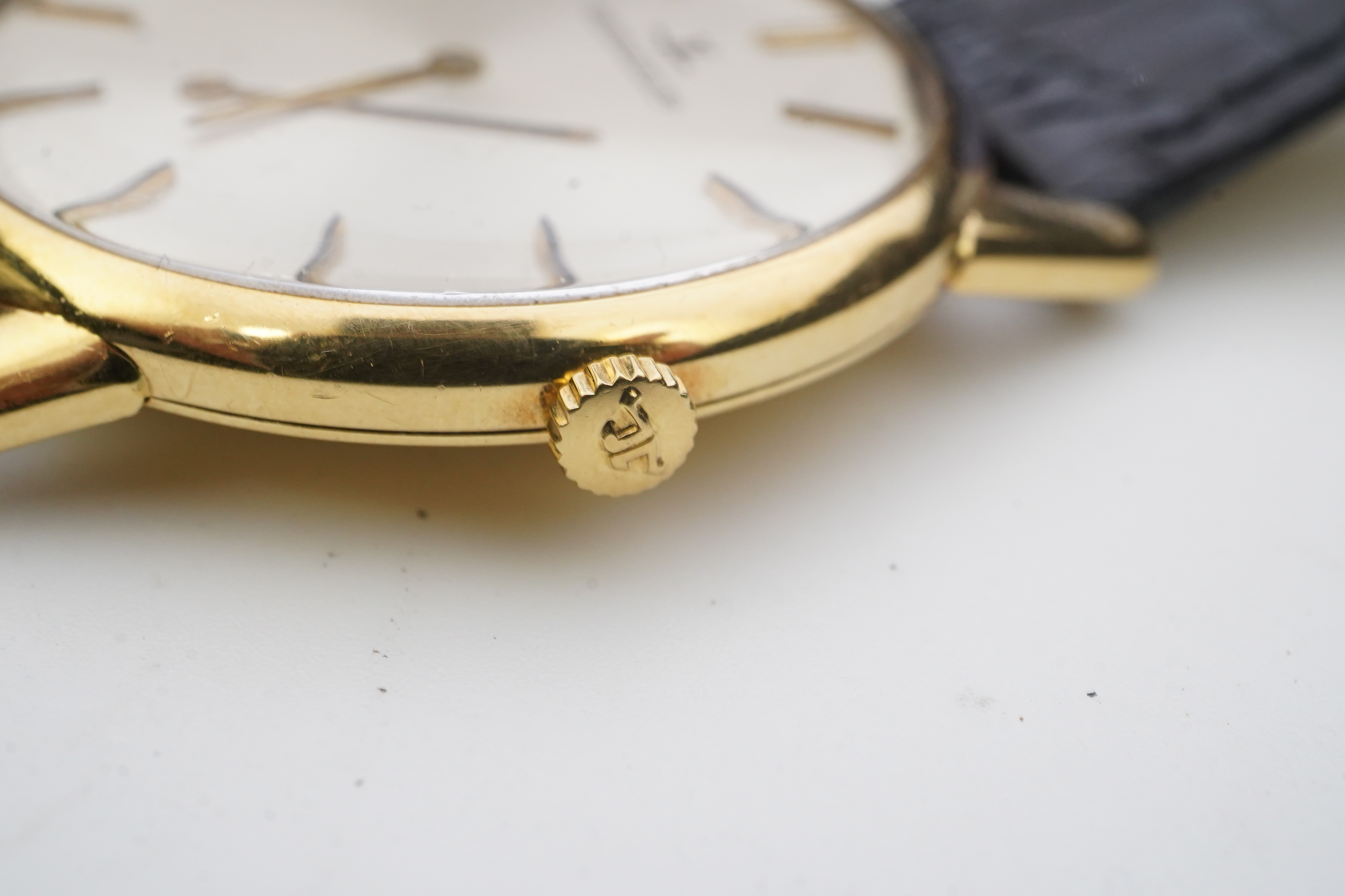 A gentleman's 18ct gold Jaeger LeCoultre manual wind dress wrist watch, on a later associated leather strap